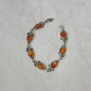 Silver bracelet with amber stones